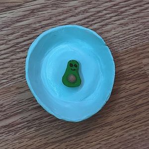 Avacado with smiley face.